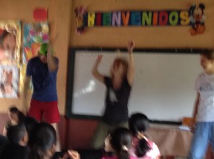 Michael, Olivia and Ansley leading singing in the school on Wednesday. FABULOUS trio! 